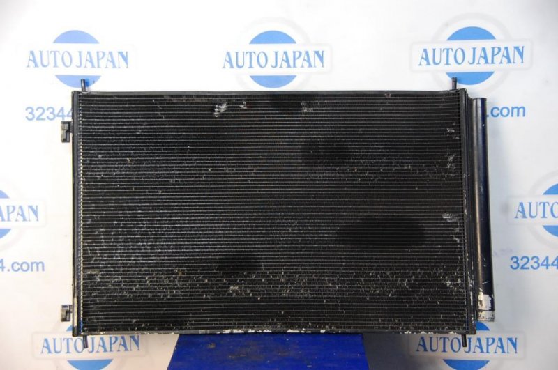 Радиатор кондиционера CX-9 06-16