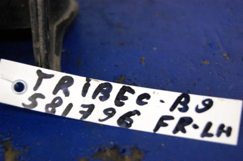 Амортизатор передний левый TRIBECA B9 05-07