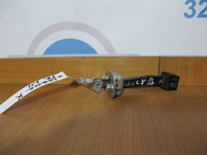 Ограничитель двери передний левый LANCER X 10 07-15