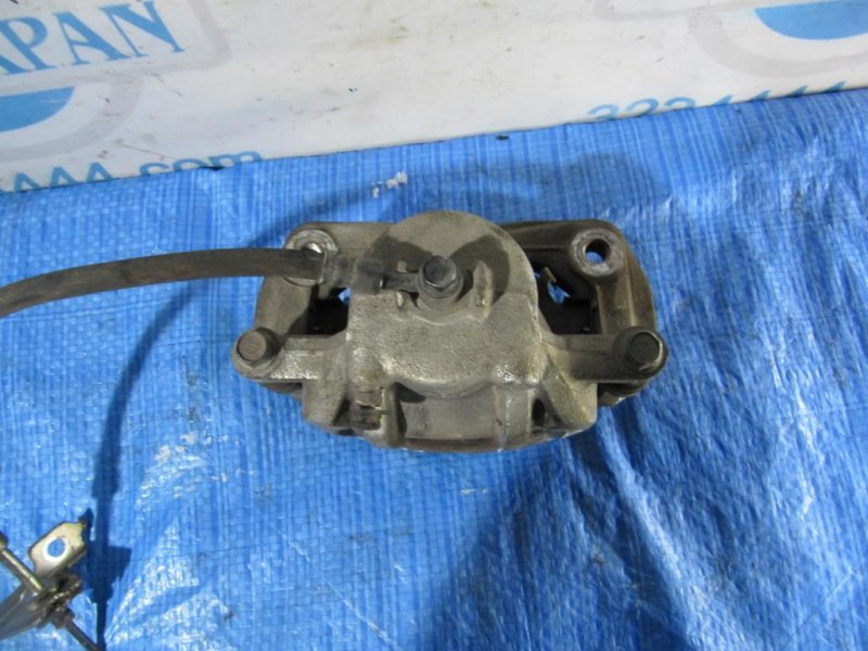 Суппорт тормозной передний левый SORENTO XM 09-14 2011 Внедорожник 2.4