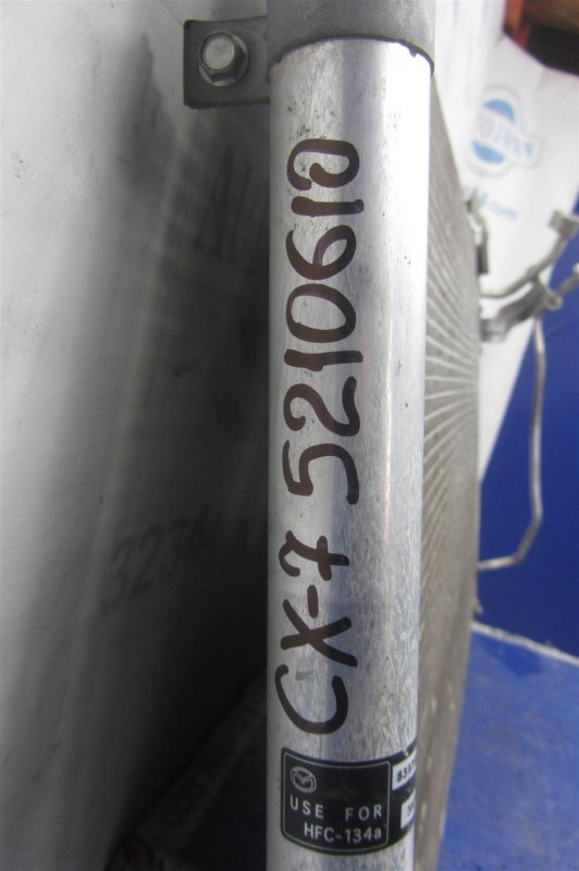 Радиатор кондиционера CX-7 06-12