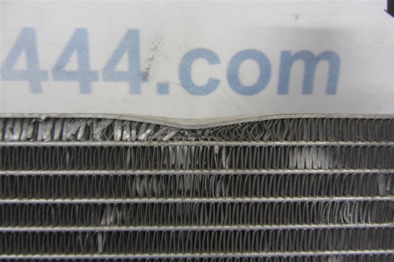 Радиатор кондиционера CX-7 06-12