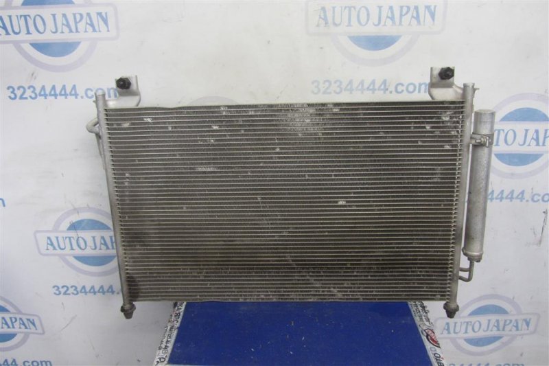 Радиатор кондиционера CX-7 06-12