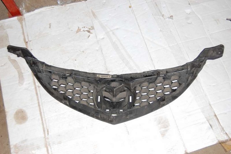Запчасть решетка радиатора MAZDA 3 BK 03-08 BR5H-50-710C Б/У Решетка радиатора MAZDA 3 BK 03-08 BR5H-50-710C Б/У