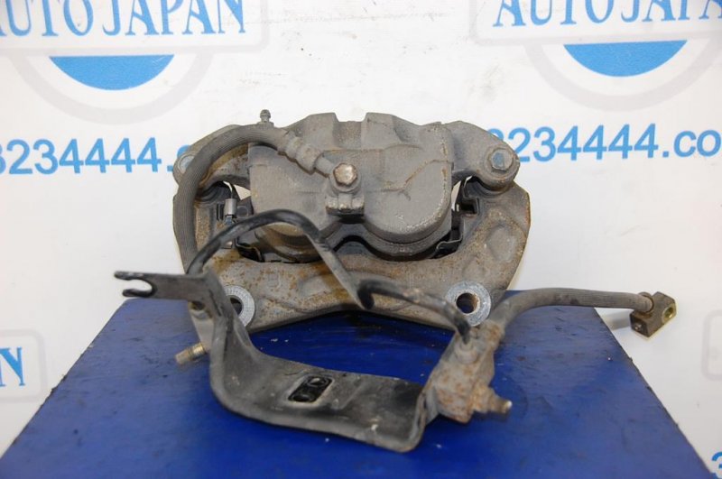 Суппорт тормозной передний левый M35/M45 04-10