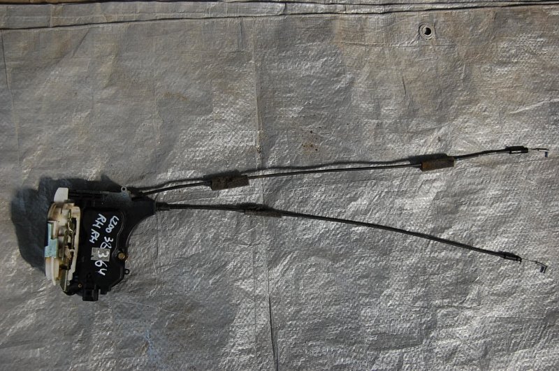 Замок двери задний правый L200 06-14