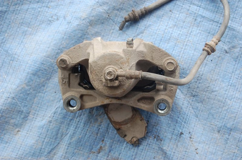 Суппорт тормозной передний правый ALTIMA L32 07-12