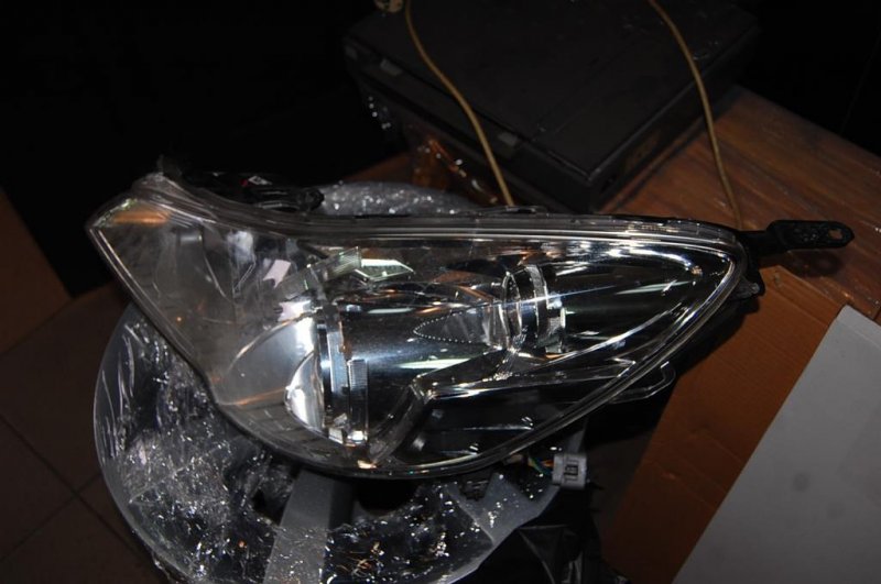 Фара передняя левая LEGACY 09-15 BM