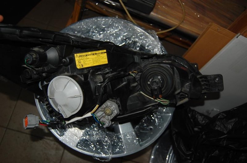 Фара передняя левая LEGACY 09-15 BM