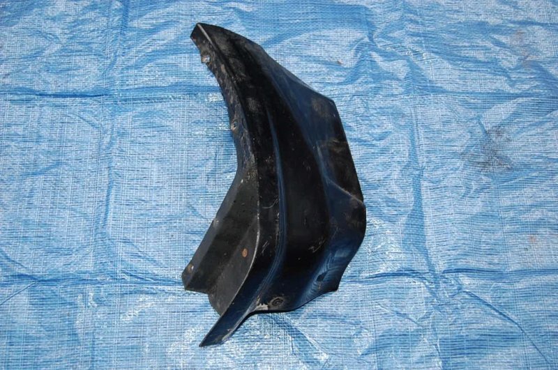 Брызговик передний левый PAJERO 99-06