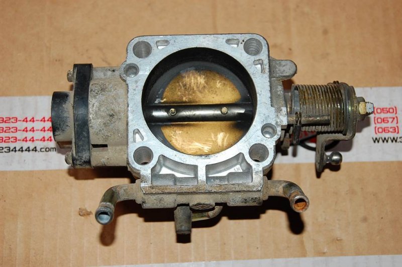 Дроссельная заслонка ALMERA 95-00