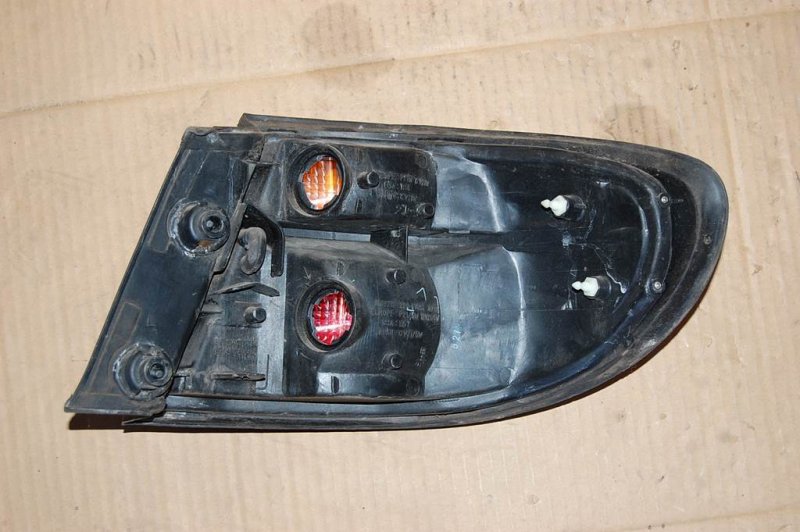 Фонарь наружный задний левый XEDOS 9 X9 (TA) 93-02