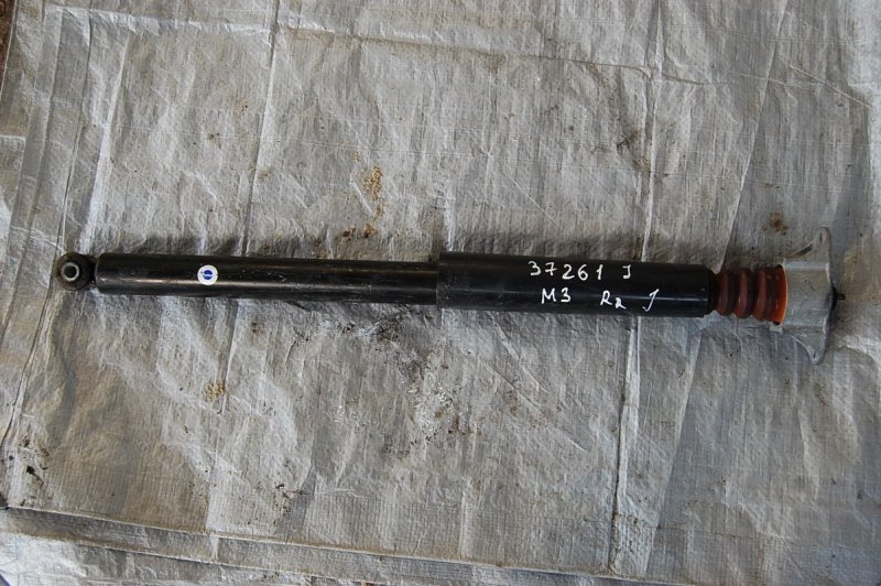 Амортизатор задний левый MAZDA 3 BL 09-13 BBM228910D Б/У