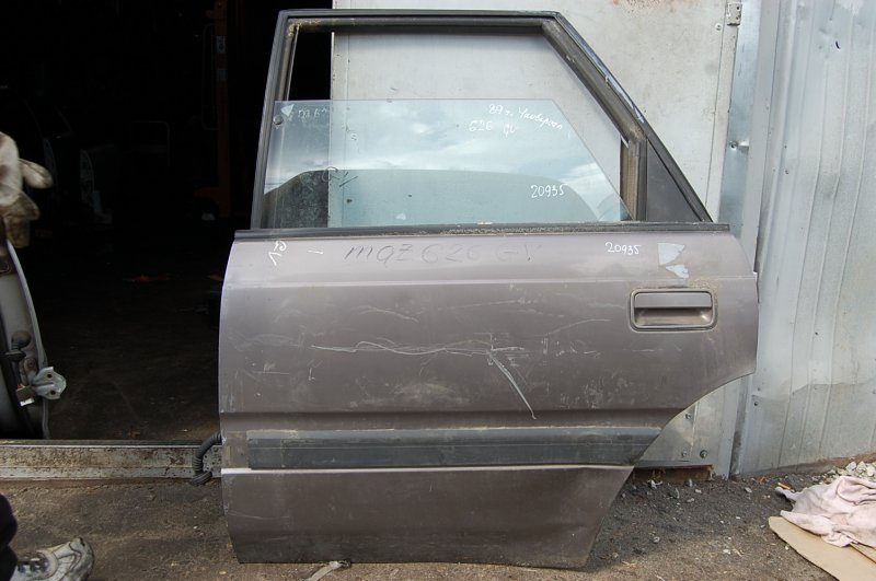Запчасть дверь задняя левая MAZDA 626 GD 87-91 GM97-73-020C Б/У Дверь задняя левая MAZDA 626 GD 87-91 GM97-73-020C Б/У