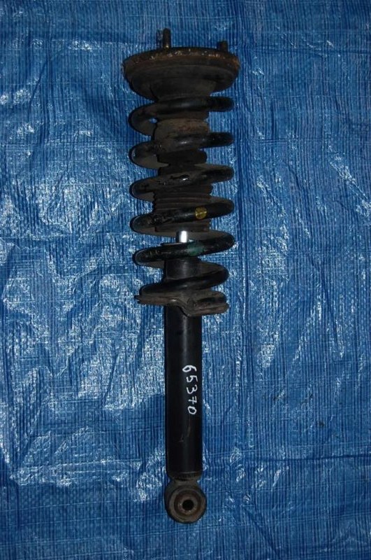 Амортизатор передний левый MITSUBISHI PAJERO 99-06 MR554292 Б/У