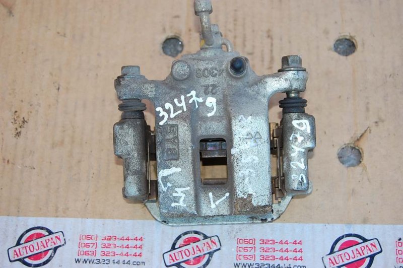 Суппорт тормозной задний левый INFINITI G35 03-07 44011EG00A Б/У