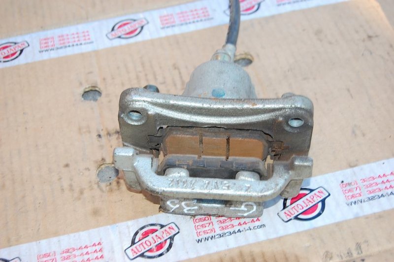 Суппорт тормозной задний левый INFINITI G35 03-07