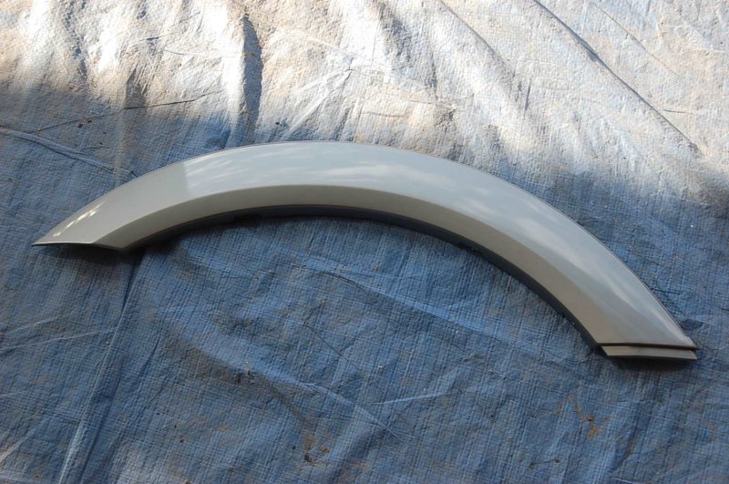 Накладка крыла (расширитель арки) передняя левая MITSUBISHI PAJERO 99-06 MR508255 новая