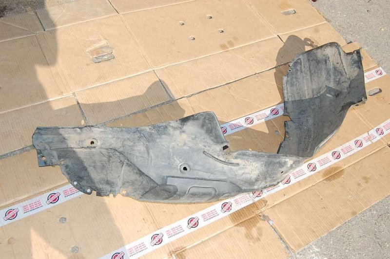 Запчасть подкрылок передний правый MAZDA 626 GE 91-97 Б/У Подкрылок передний правый MAZDA 626 GE 91-97 Б/У