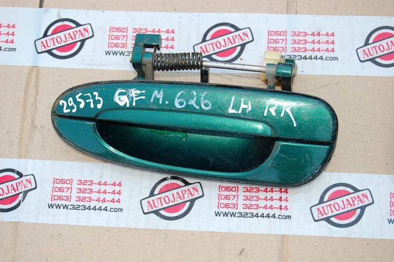 Запчасть ручка двери наружная задняя левая MAZDA 626 GF 97-02 Б/У Ручка двери наружная задняя левая MAZDA 626 GF 97-02 Б/У