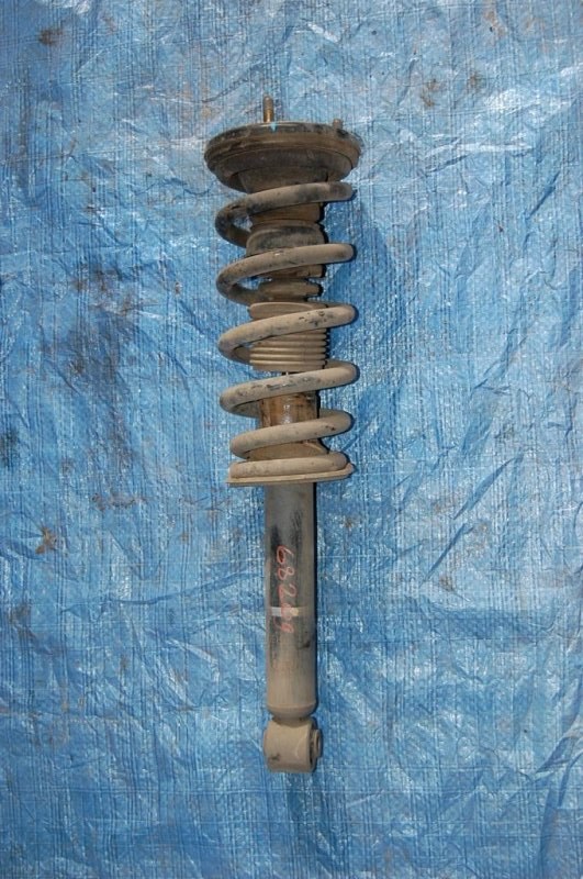 Амортизатор передний левый MITSUBISHI PAJERO 99-06 MR554292 Б/У