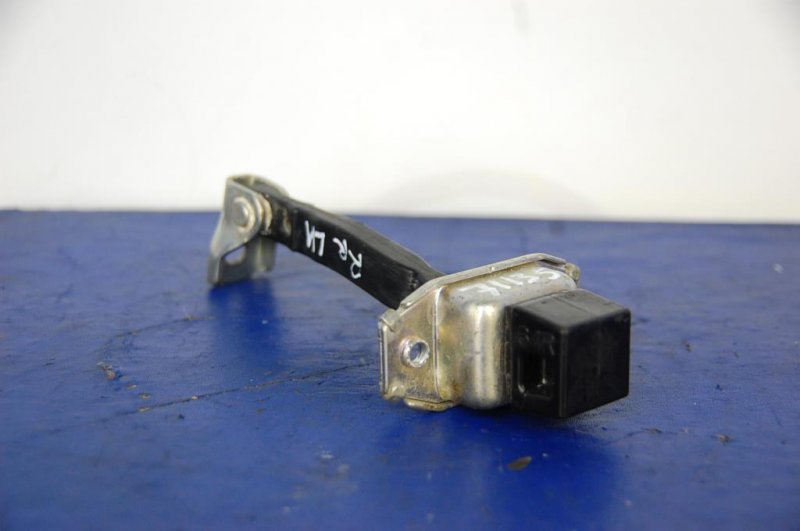 Ограничитель двери задний левый LANCER X 10 07-15