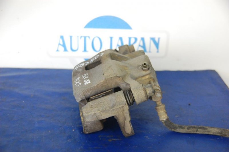 Суппорт тормозной задний правый SX4 06-13