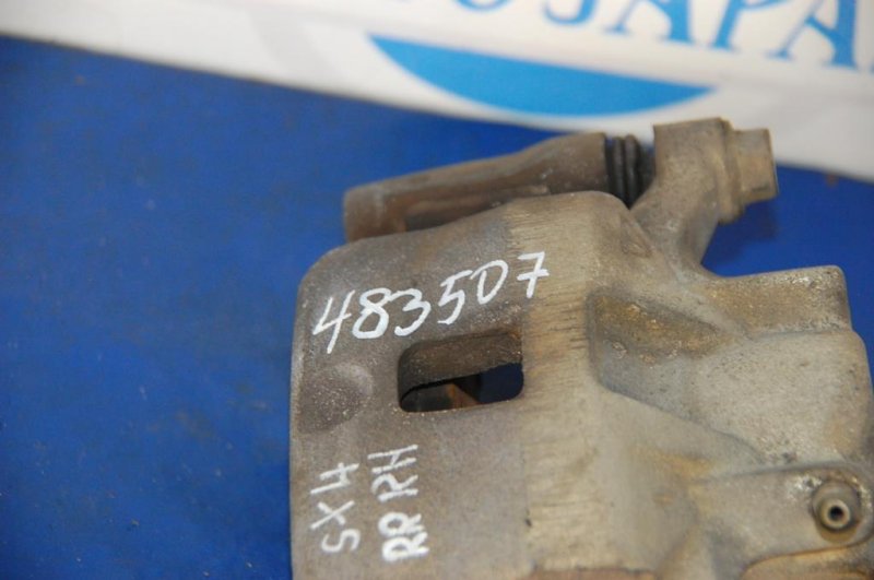 Суппорт тормозной задний правый SUZUKI SX4 06-13