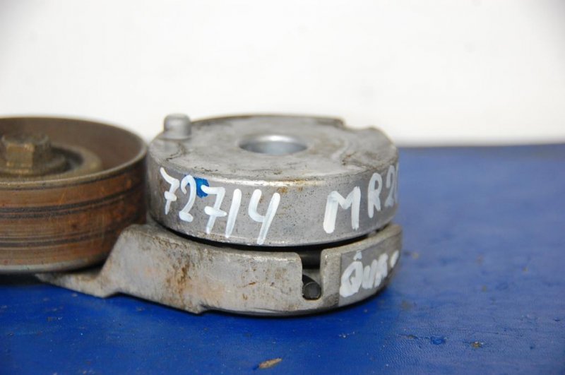 Натяжитель ремня генератора QASHQAI 07-14