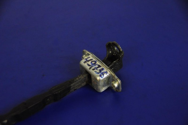 Ограничитель двери задний левый SUZUKI SX4 06-13