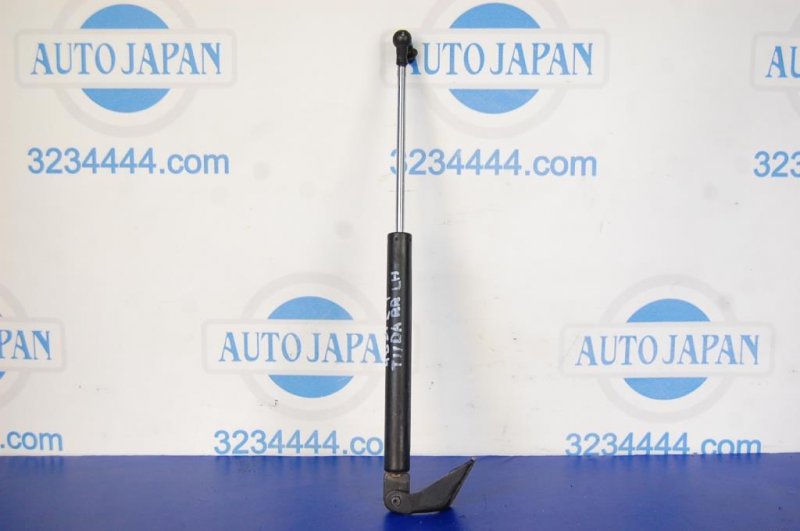 Запчасть амортизатор крышки багажника левый NISSAN TIIDA/VERSA C11 04-11 90451-EL00A Б/У Амортизатор крышки багажника левый NISSAN TIIDA/VERSA C11 04-11 90451-EL00A Б/У