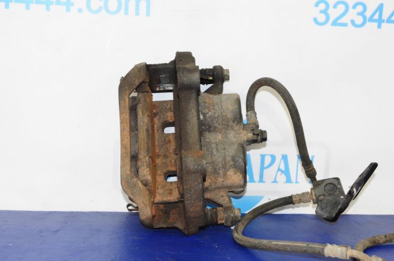 Суппорт тормозной передний левый G35 03-07