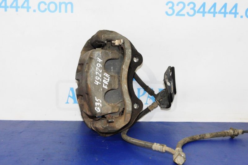 Суппорт тормозной передний левый INFINITI G35 03-07 41011CM40A Б/У