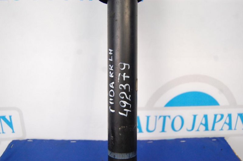 Амортизатор задний левый TIIDA/VERSA C11 04-11