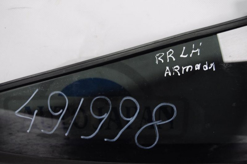 Стекло двери глухое заднее левое QX56 / TITAN / ARMADA 04-16