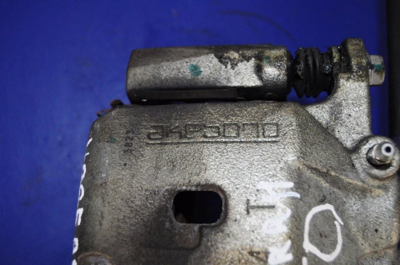 Суппорт тормозной передний правый Q50 15-20