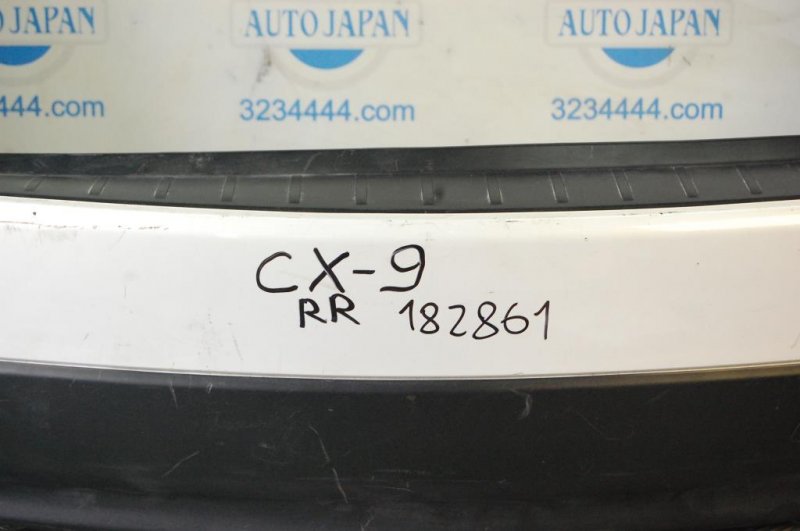 Бампер задний CX-9 06-16