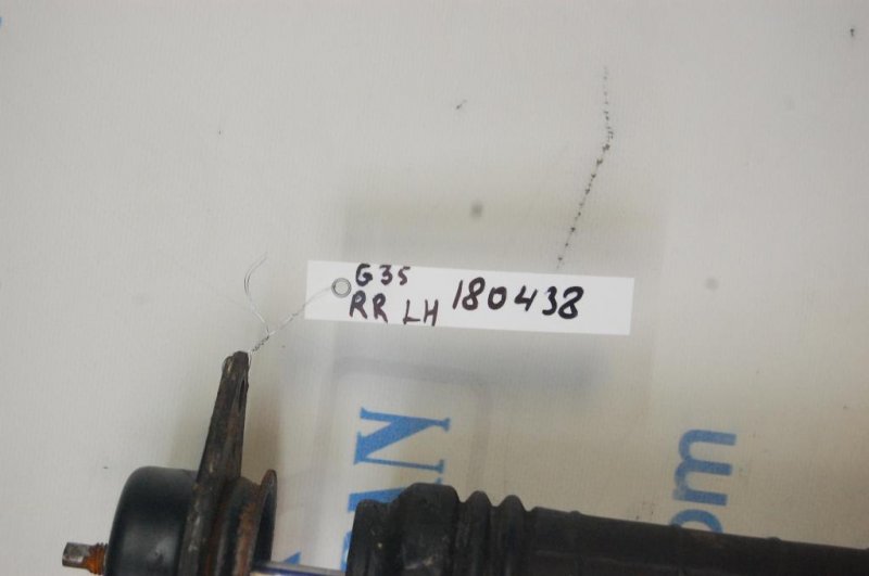 Амортизатор задний левый INFINITI G25/G35/G37/Q40 06-14