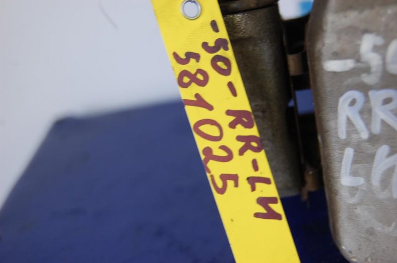 Суппорт тормозной задний левый TOYOTA CAMRY 50 12-15