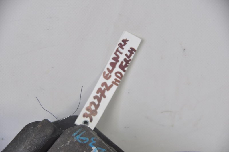 Суппорт тормозной передний левый ELANTRA HD 06-11