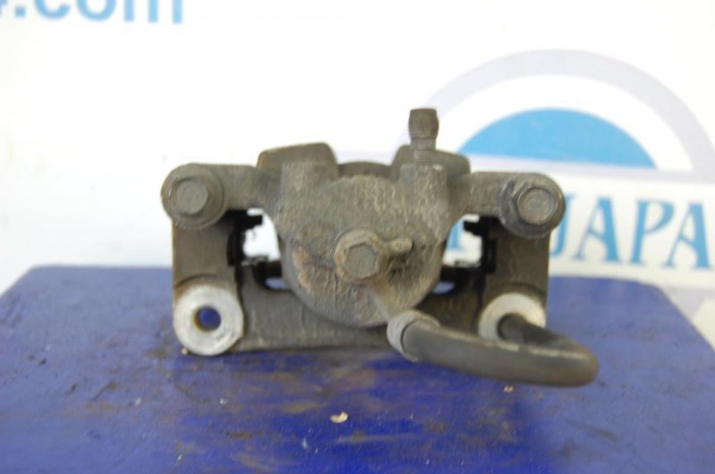 Суппорт тормозной задний правый INFINITI G25/G35/G37/Q40 06-14