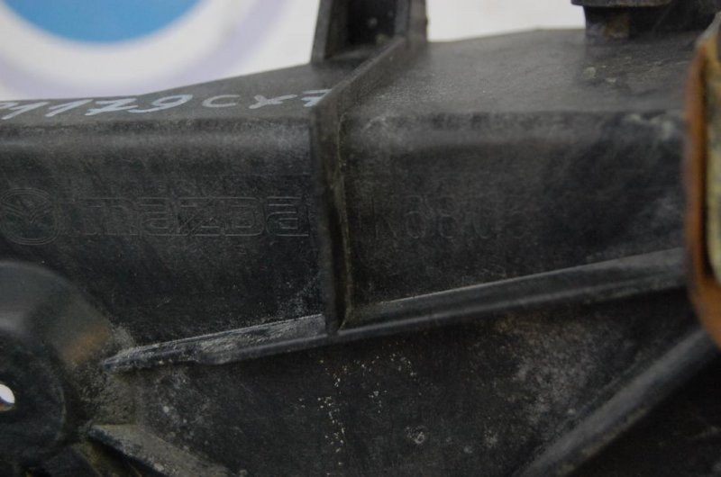 Полка аккумулятора CX-7 06-12