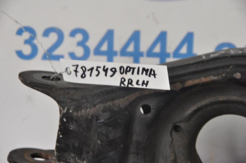 Рычаг задней подвески поперечный нижний задний левый OPTIMA TF 11-16 Рычаг задней подвески поперечный нижний задний левый OPTIMA TF 11-16