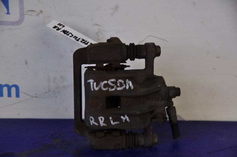 Суппорт тормозной задний левый HYUNDAI TUCSON 04-10 58310-2EA10 Б/У
