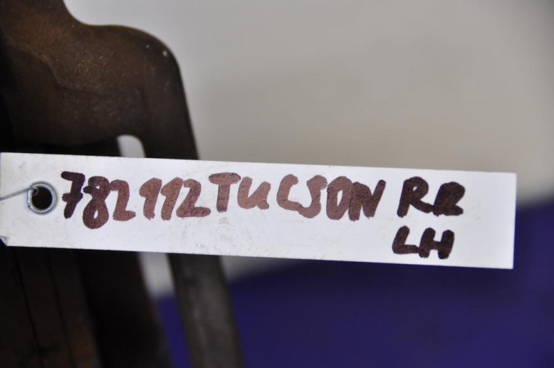 Суппорт тормозной задний левый TUCSON 04-10