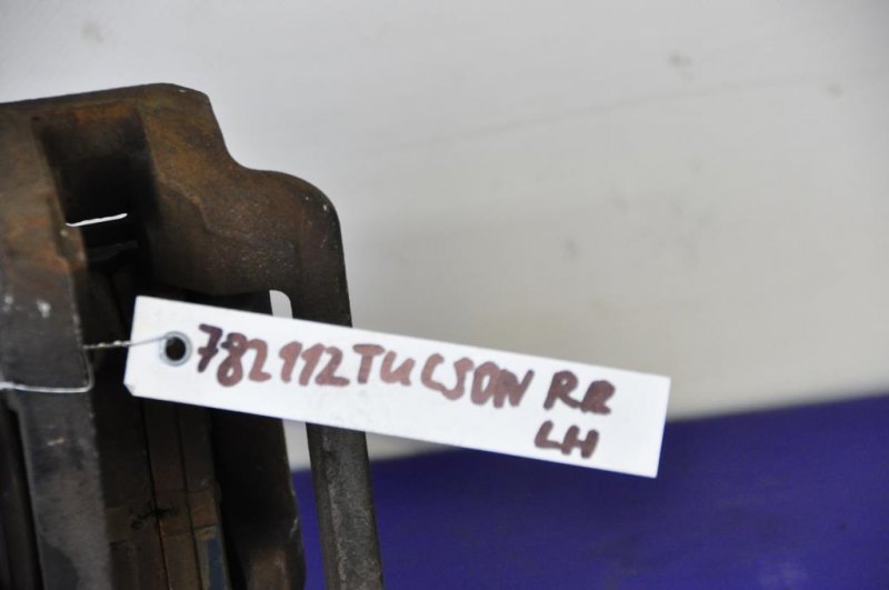 Суппорт тормозной задний левый HYUNDAI TUCSON 04-10