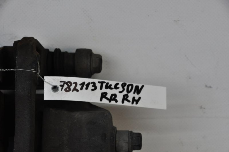 Суппорт тормозной задний правый HYUNDAI TUCSON 04-10 Суппорт тормозной задний правый HYUNDAI TUCSON 04-10