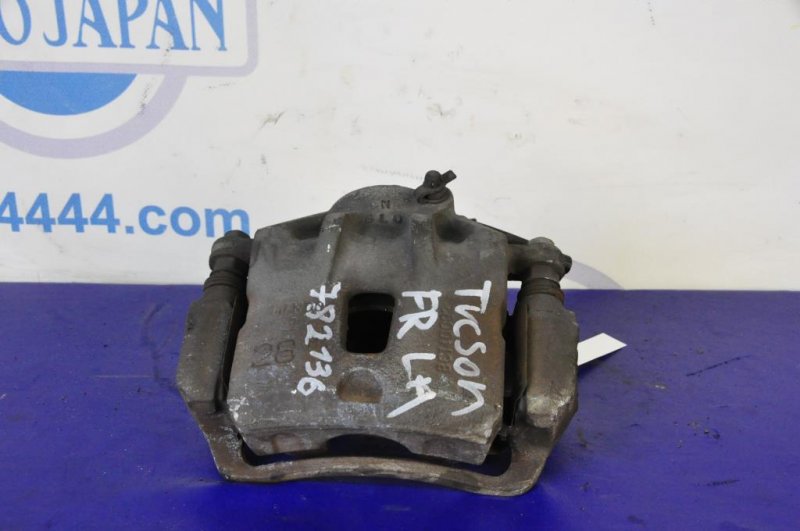 Суппорт тормозной передний левый TUCSON 04-10 Суппорт тормозной передний левый TUCSON 04-10
