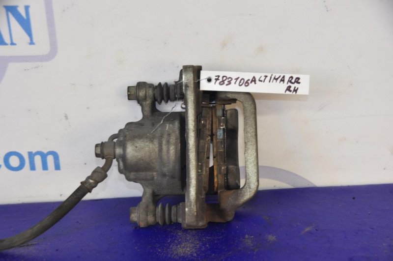 Суппорт тормозной задний правый ALTIMA L32 07-12