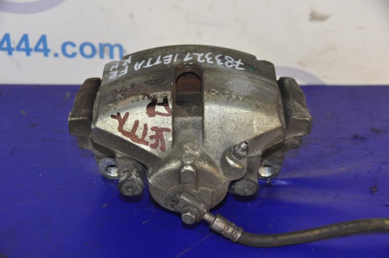 Суппорт тормозной передний правый JETTA USA 10-17